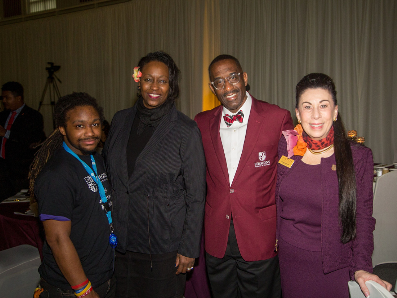 Young poses for a photo with GEA HR VP Rocki Rockingham, Simmons President Kevin Cosby and Barbara Sexton Smith 